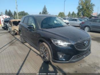  Salvage Mazda Cx